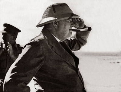 World War Two. British Prime Minister Winston Churchill viewing the Alemein position during his visit to the Western desert in the Middle East August 1942.