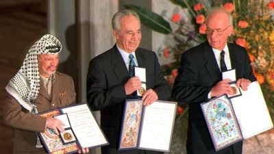 Arafat, Peres, and Rabin with their shared Nobel Prize, 1994.