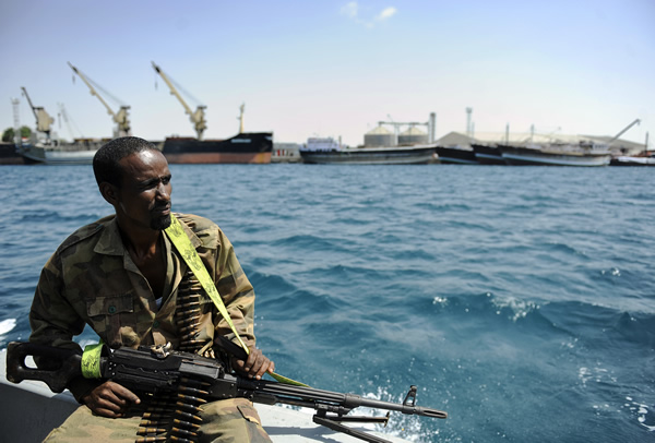 Amid growing threats of piracy, a Somali coastguard returns from a patrol off the coast on April 30, 2011