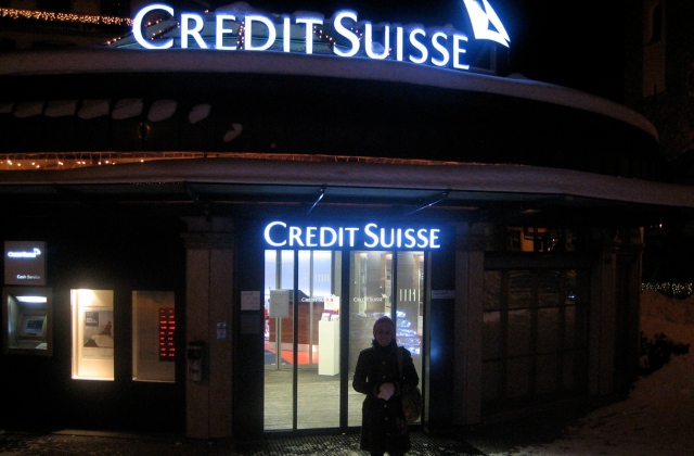 Image: Global markets continue to slide as Swiss bank giant Credit Suisse loses more than 60 percent of its value after UBS buys it