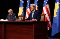 U.S. Secretary of State John Kerry, right, and Kosovo's Prime Minister, Isa Mustafa, speak to reporters after their meeting at Pristina International Airport in Pristina, Kosovo Wednesday, Dec. 2, 2015. (Jonathan Ernst/Pool Photo via AP)