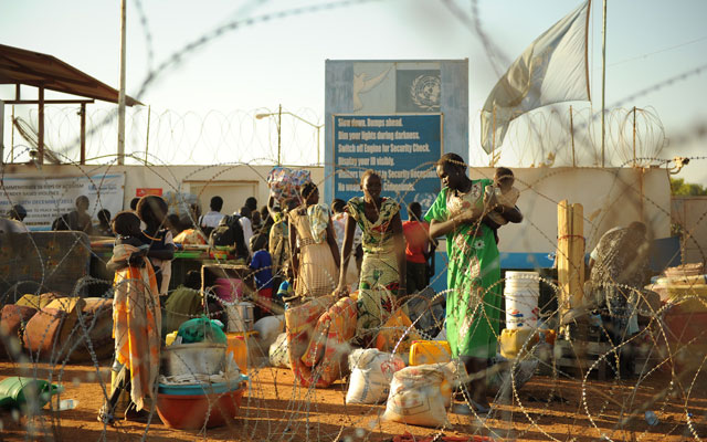 Residents of Juba arrive at the U.N. compound, where they sought shelter. (Photo: TONY KARUMBA/AFP/Getty Images/Newscom)