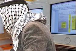 Arab in front of computer