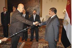 Morsi and new Vice President Judge Mahmoud Mekki