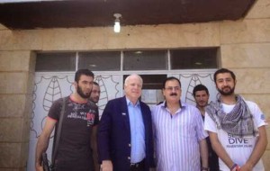 McCain posed for pictures with these ISIS rebels, smiling as the camera snapped. Now, ISIS, Islamic State of Iraq and Syria formerly known as Al Qaeda in Iraq, is using those pictures as a campaign ad. 