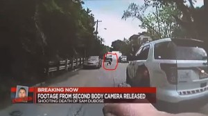 Second video  from an arriving officer  shows OfficerTensing lying in the road.