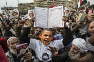 Obama protesting with Koran