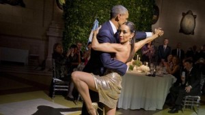 President Barack Obama with does the tango with a dancer during the State Dinner at the Centro Cultural Kirchner, Wednesday, March 23, 2016, in Buenos Aires, Argentina. (AP Photo/Pablo Martinez Monsivais)